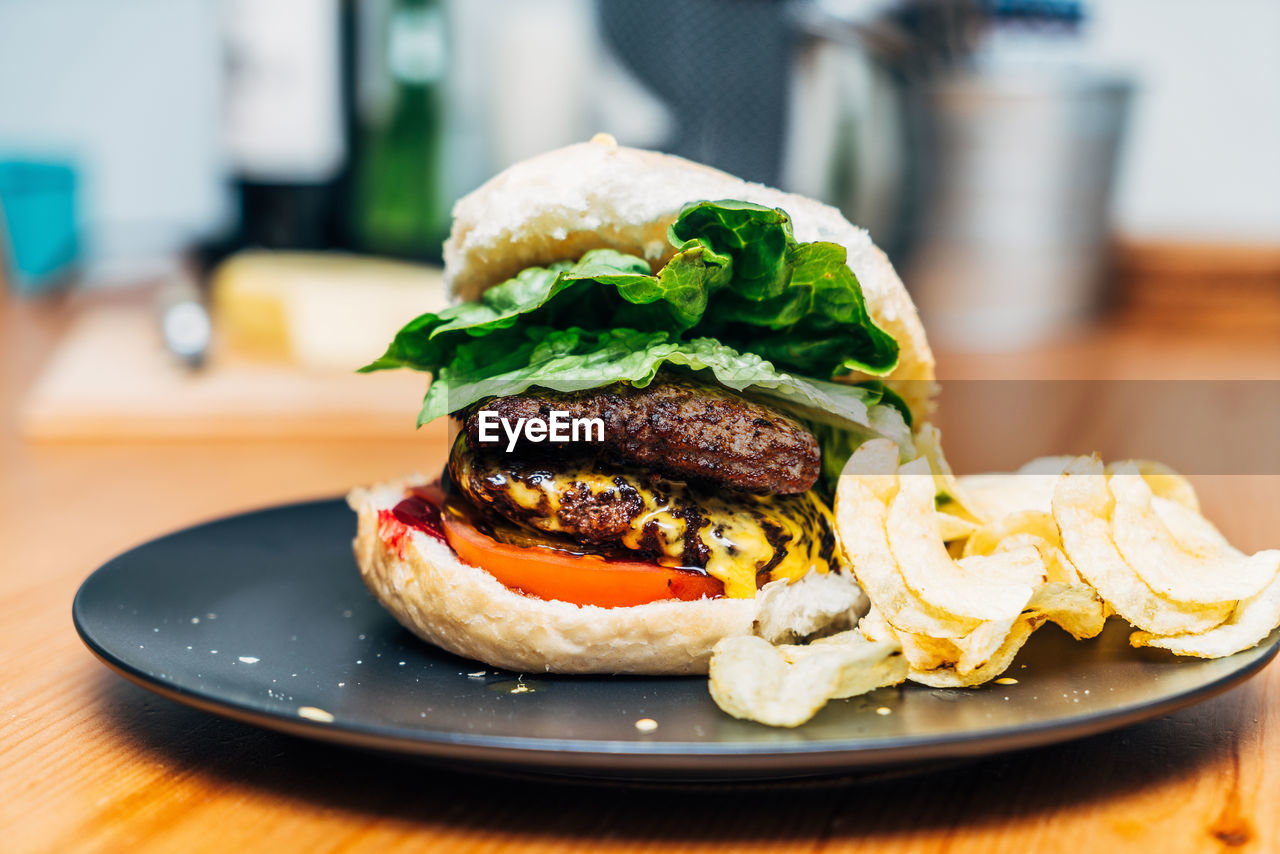 Close-up of burger in plate on table