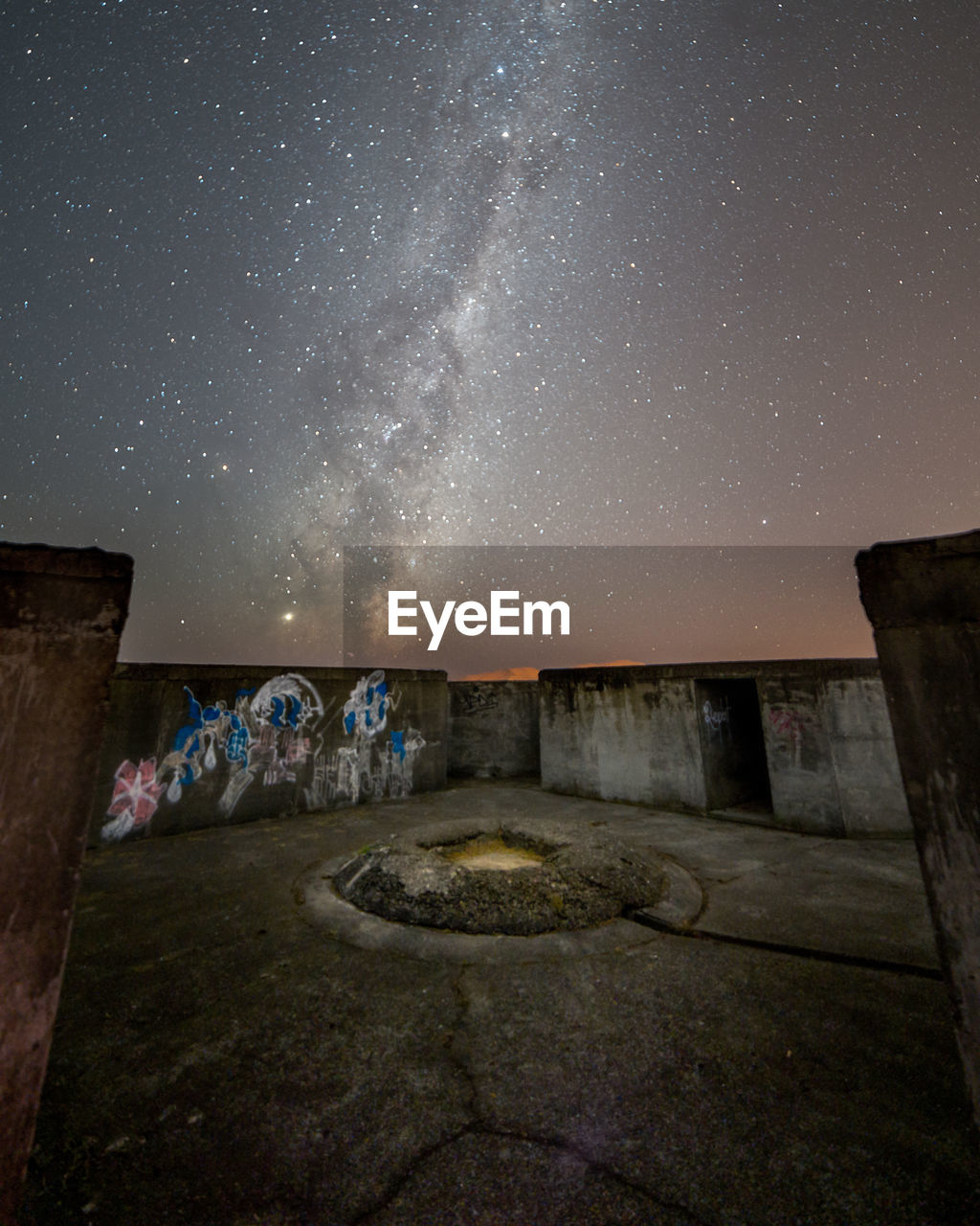 OLD RUIN AGAINST SKY AT NIGHT