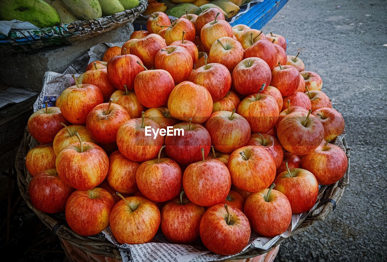 High angle view of kashmiri apples in the market.