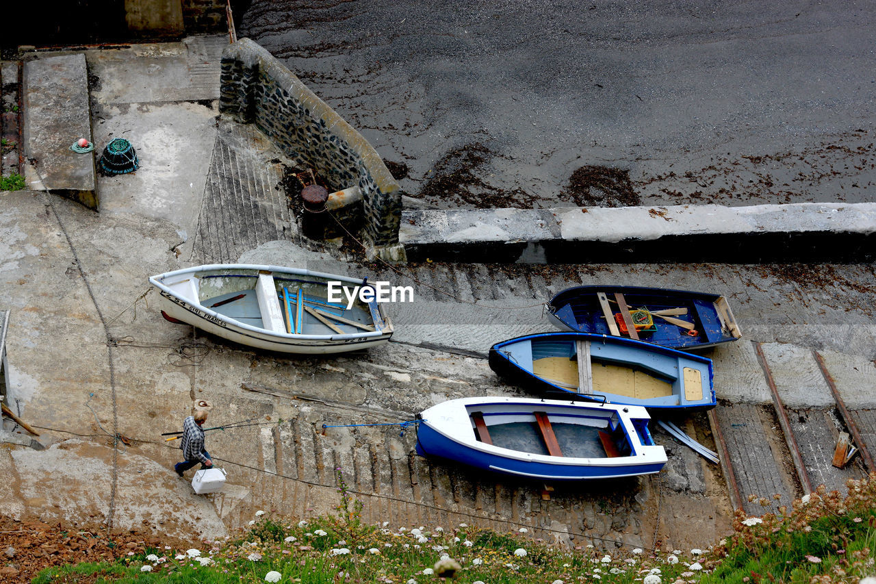 High angle view of rowboats on pier at harbor