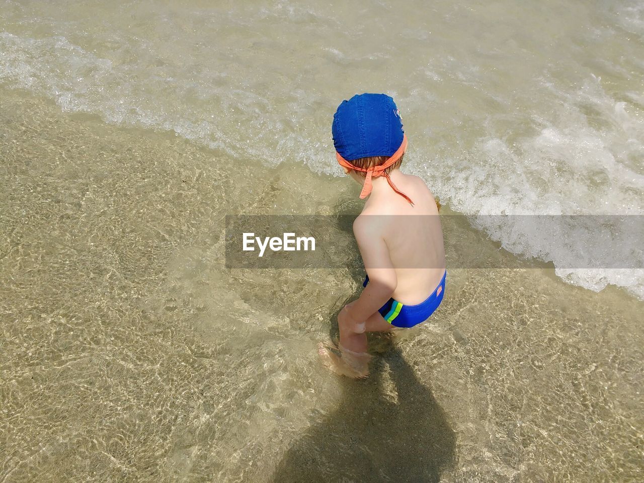 High angle view of boy at beach