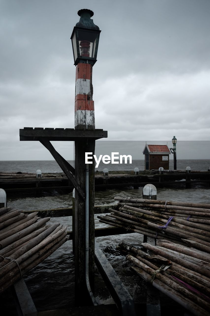 VIEW OF PIER ON SEA AGAINST SKY