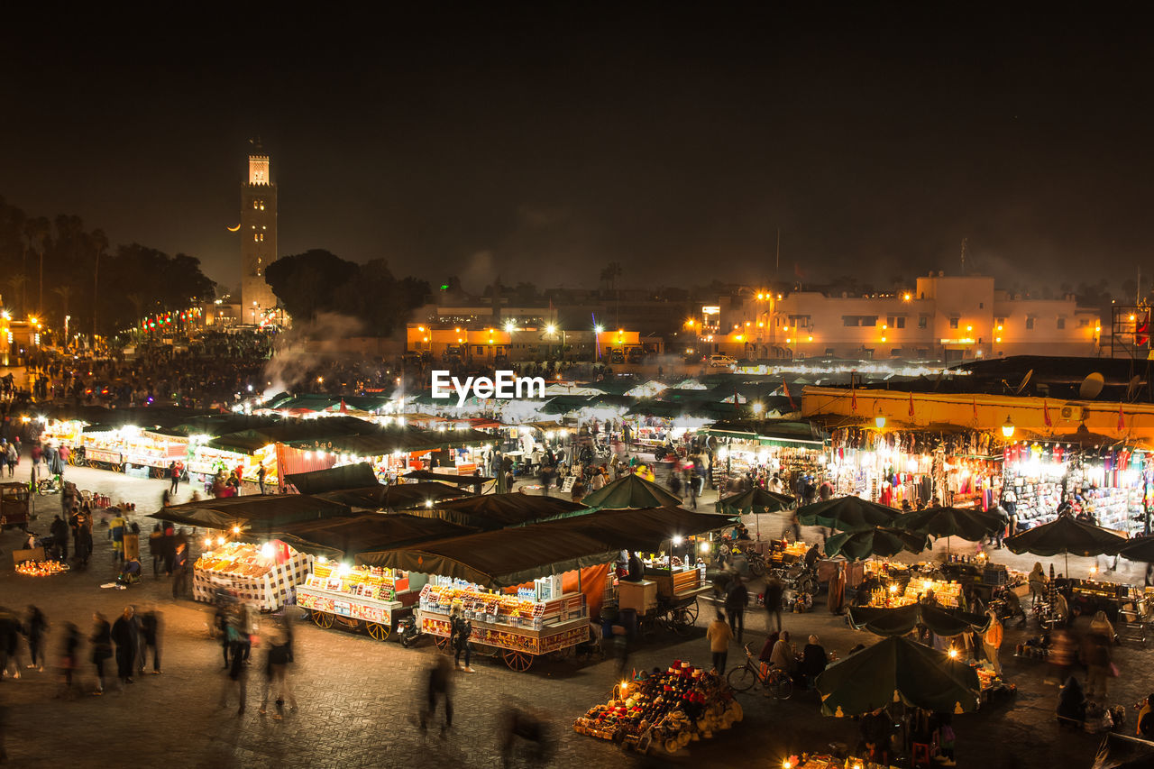 High angle view of illuminated market at night