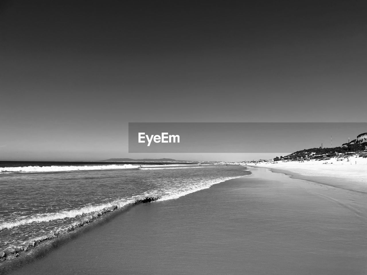 PANORAMIC VIEW OF BEACH AGAINST CLEAR SKY