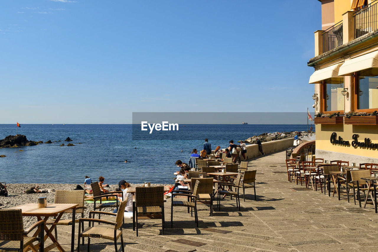 Outdoor cafe on the seashore of boccadasse, genoa