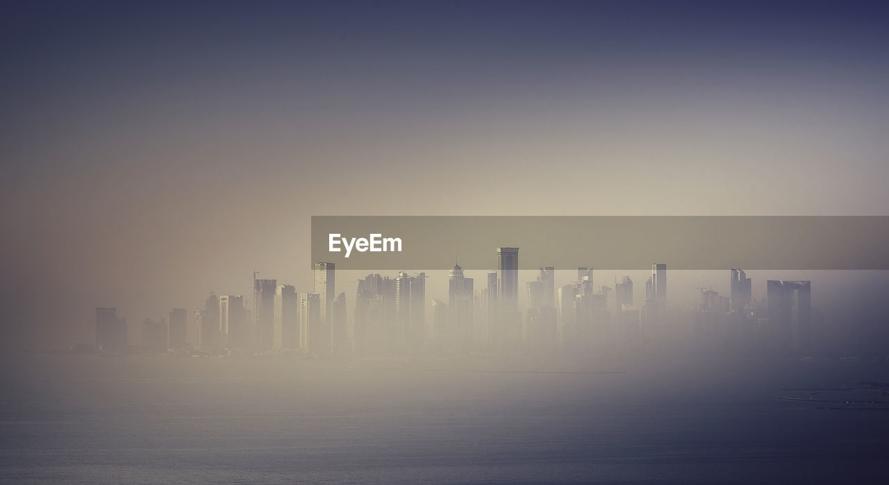 City skyline in foggy weather