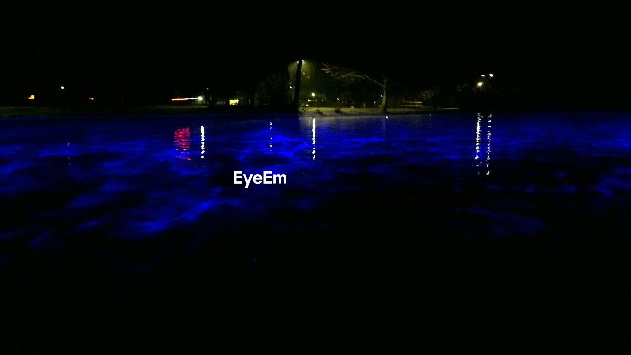 VIEW OF ILLUMINATED WATER