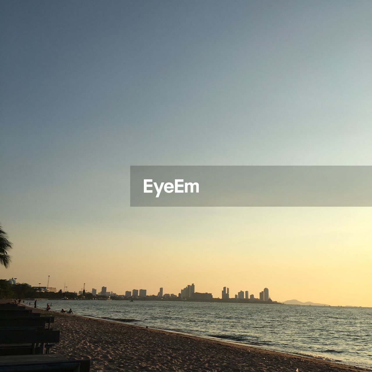 SCENIC VIEW OF SEA BY BUILDINGS AGAINST SKY