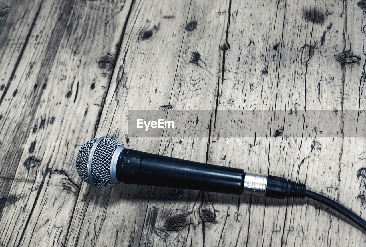 High angle view of microphone on table