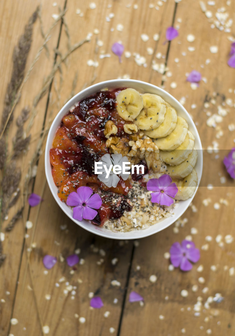 HIGH ANGLE VIEW OF PURPLE FOOD IN BOWL ON TABLE