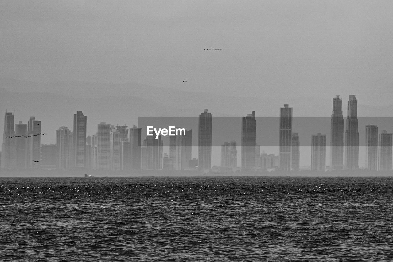 Skyline of panama city in a cloudy day seen from the water