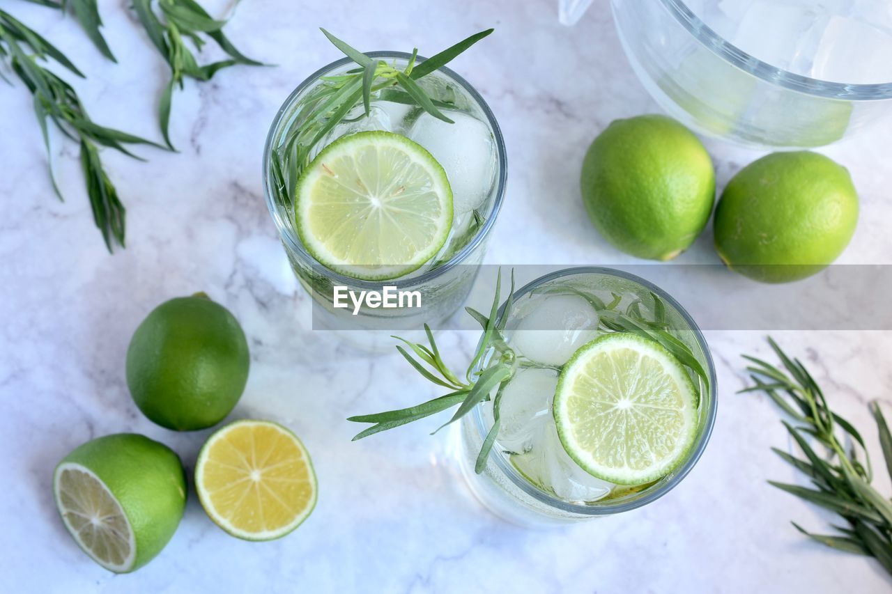 High angle view of fruits on table and drinks 