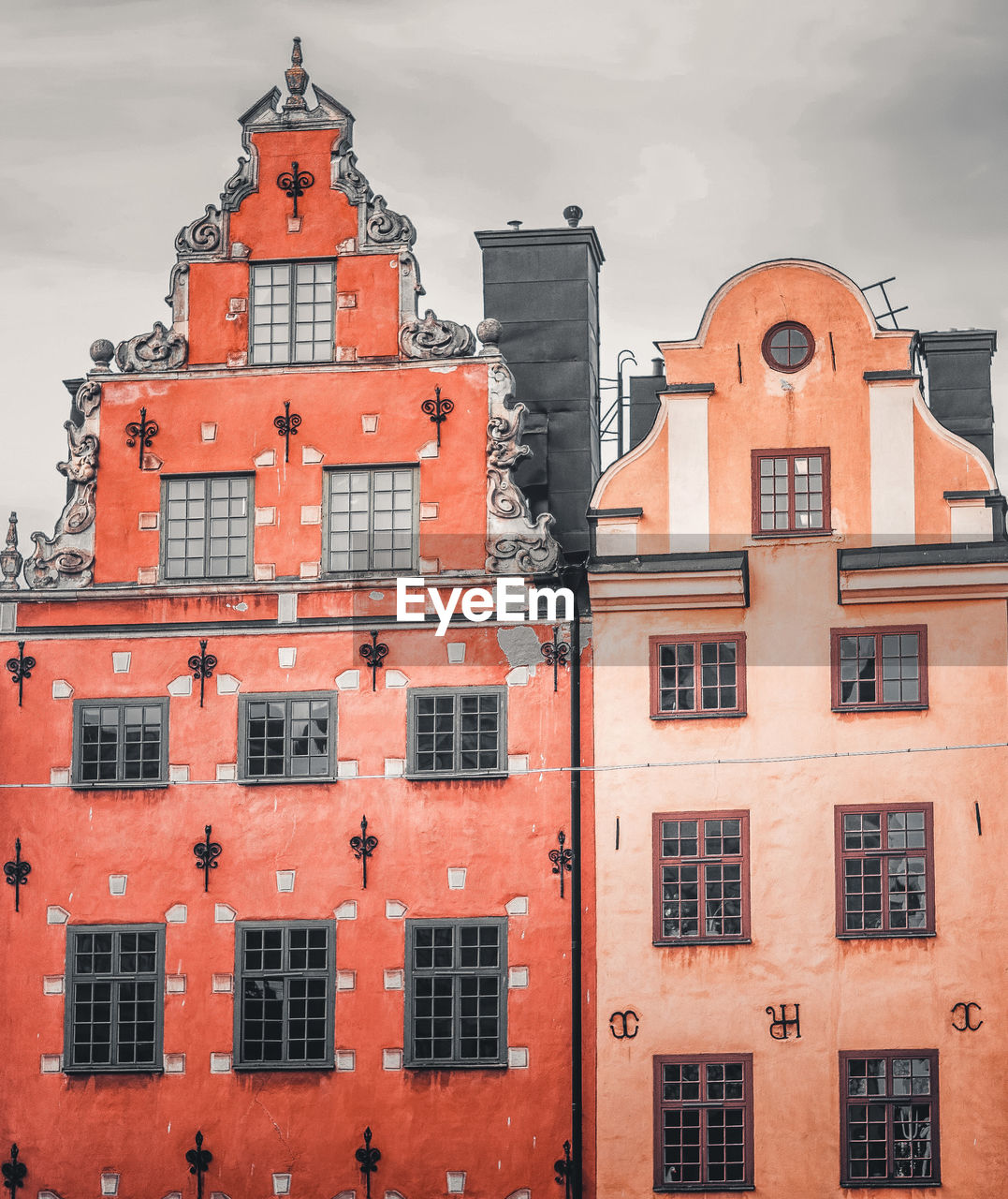 Low angle view of red building against sky