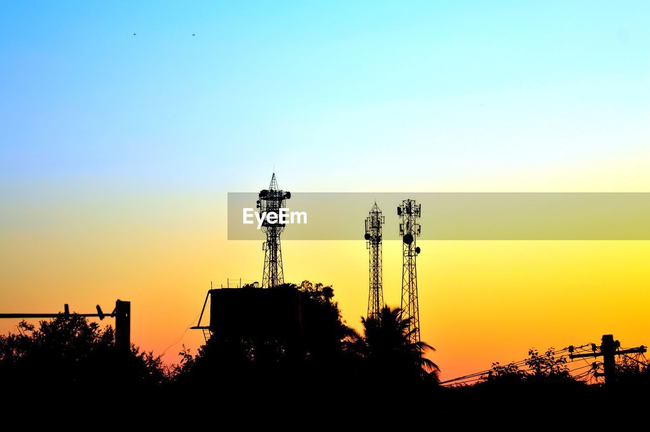 LOW ANGLE VIEW OF SILHOUETTE TREE AGAINST ORANGE SKY