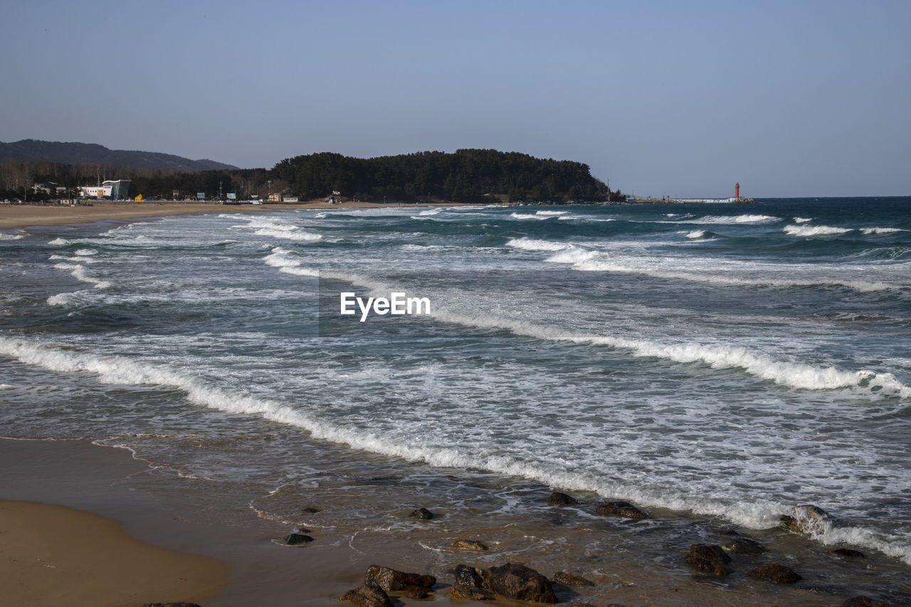 Scenic view of sea against clear sky