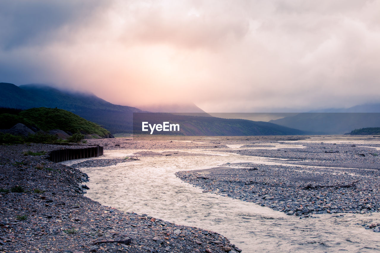 Scenic view of sea against sky during sunset