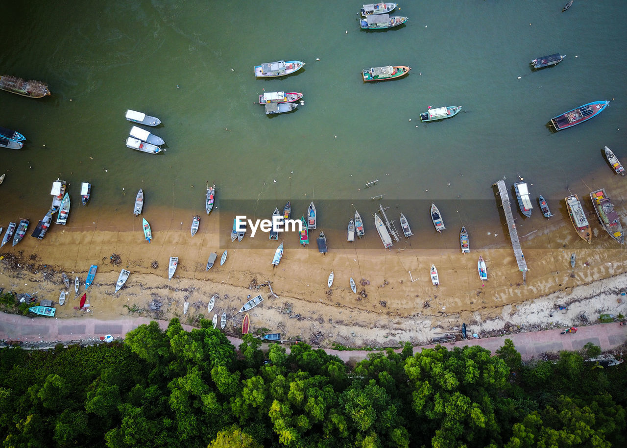 Aerial view of nautical vessels at beach