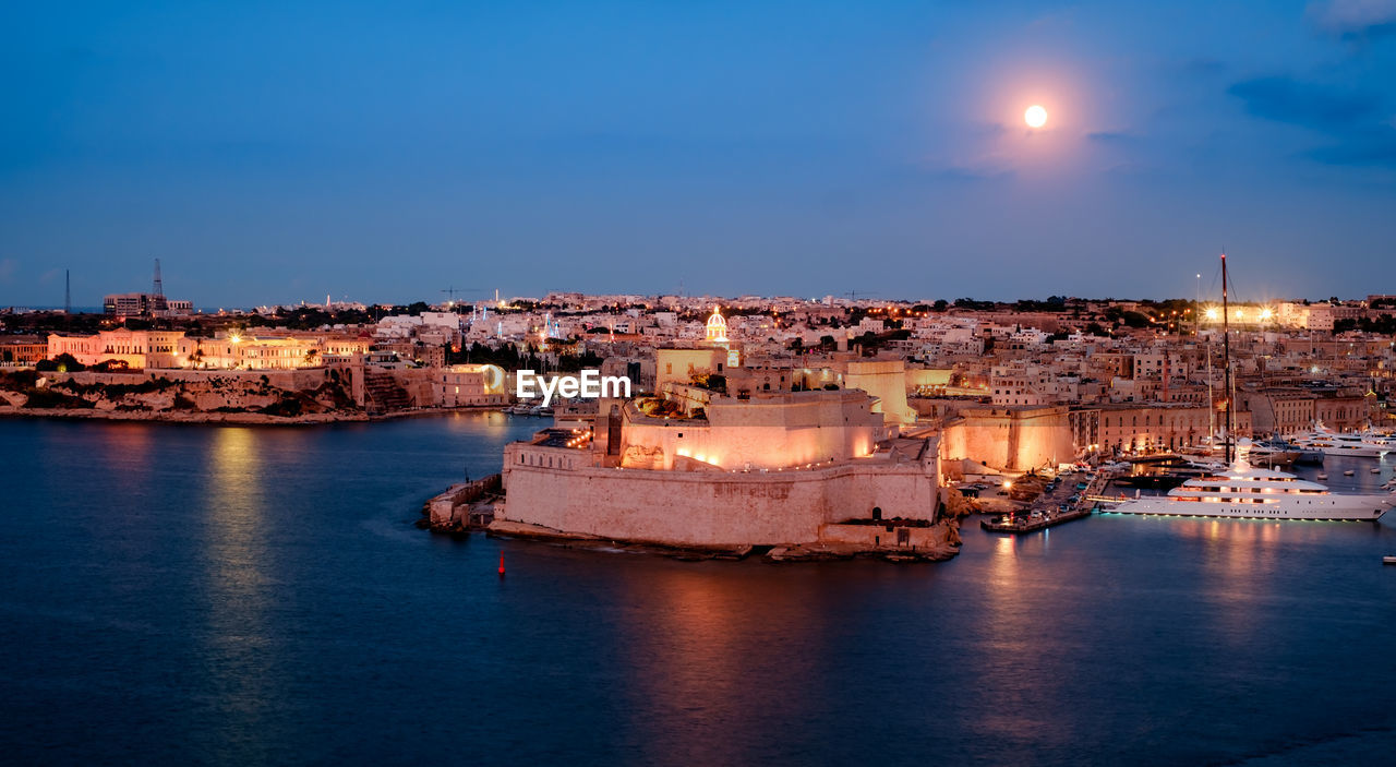 Fort st. angelo with scenic grand harbour views  historical displays at blue hours in malta