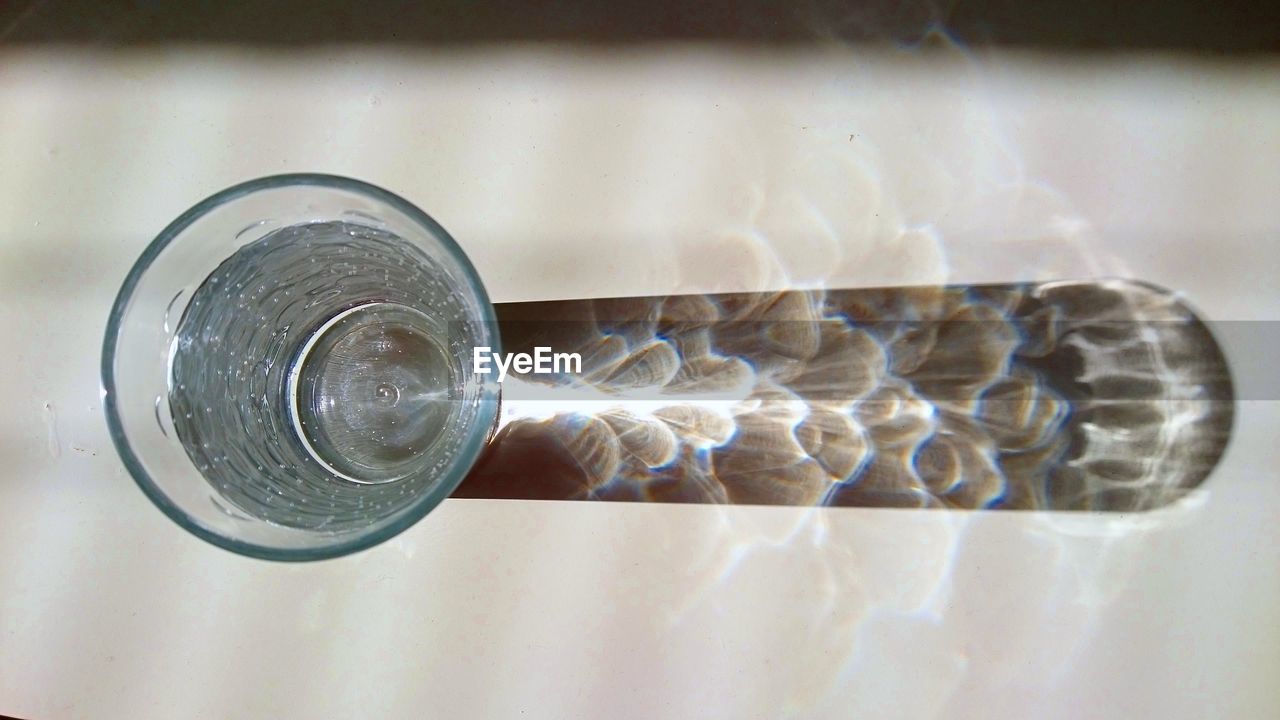 CLOSE-UP OF DRINK IN CONTAINER