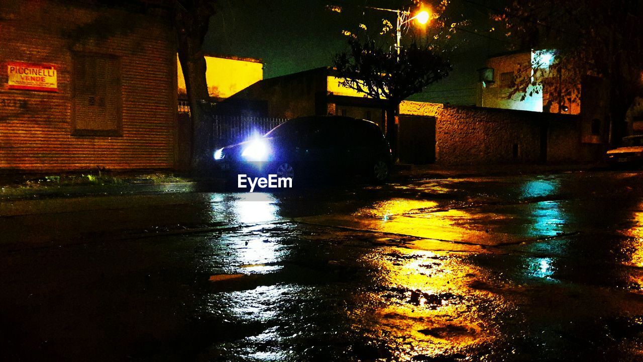 REFLECTION OF ILLUMINATED BUILDINGS IN WATER