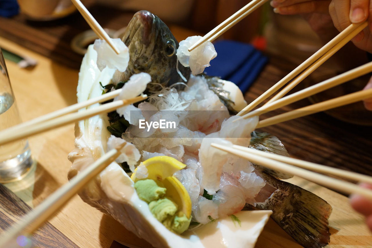 Close-up of fresh seafood served in plate on table
