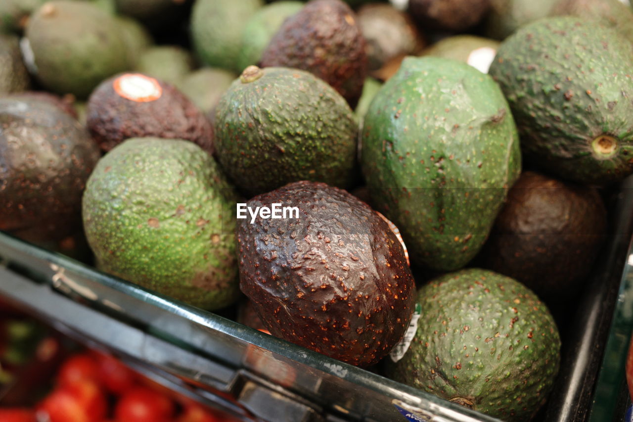 CLOSE-UP OF FRUITS IN MARKET