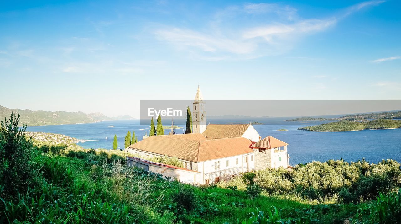 PANORAMIC SHOT OF CALM BLUE SEA AGAINST SKY