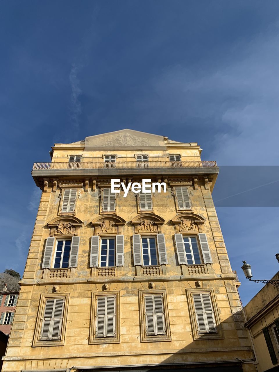 architecture, built structure, sky, building exterior, building, low angle view, city, tower block, landmark, nature, window, no people, cloud, blue, facade, apartment, residential district, day, outdoors, urban area, sunlight