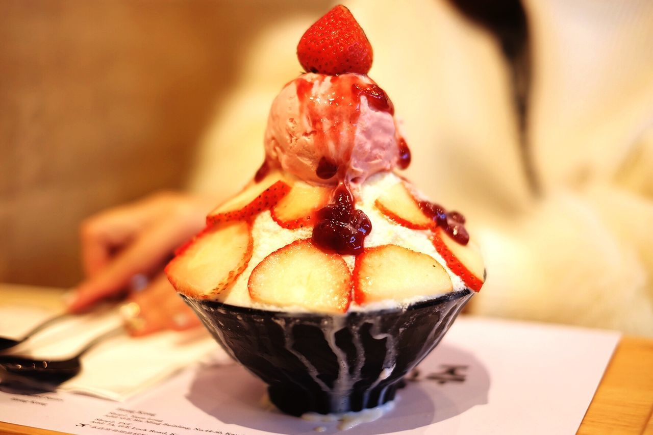 CLOSE-UP OF ICE CREAM IN GLASS