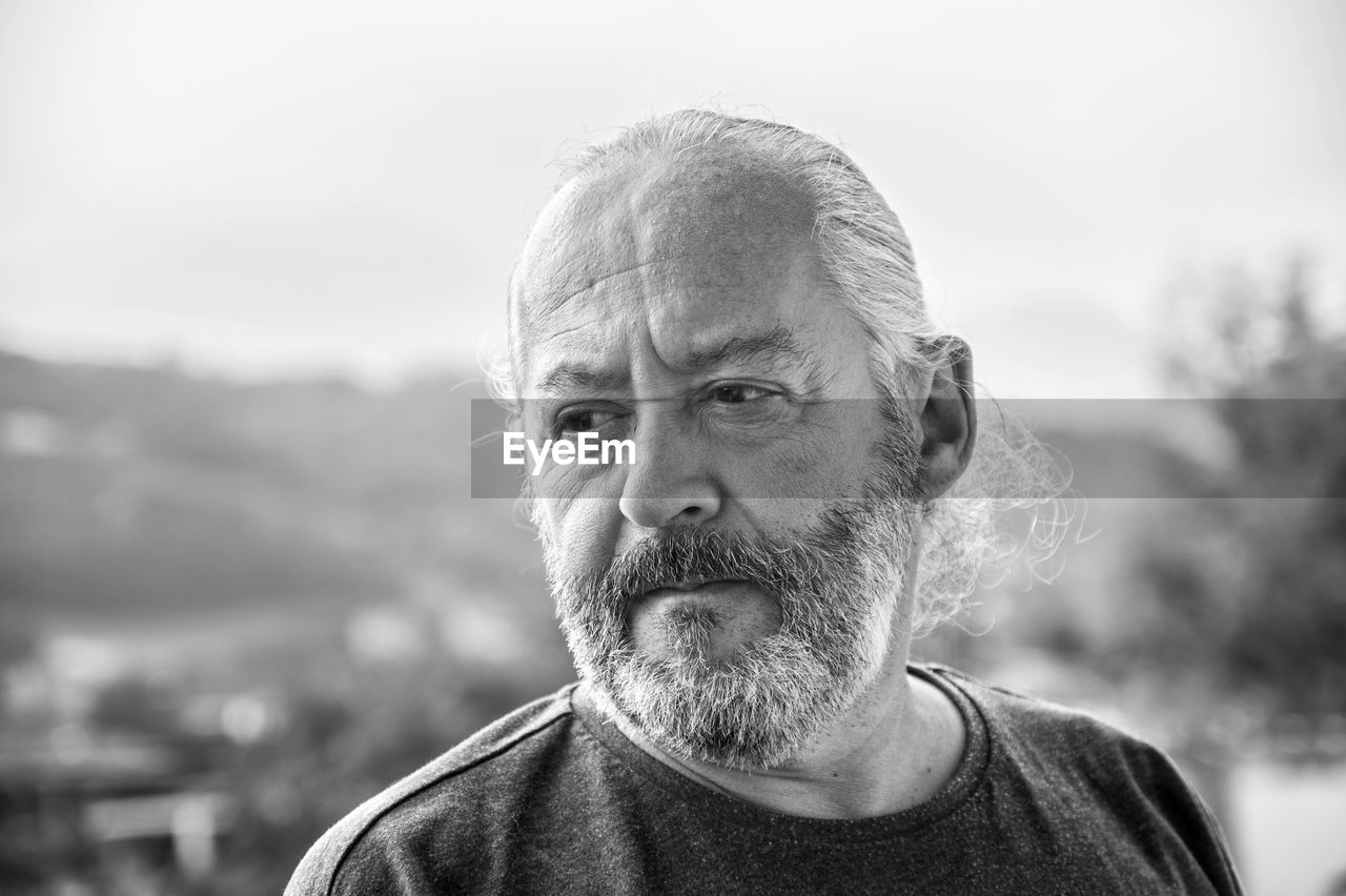 Portrait of man against blurred background