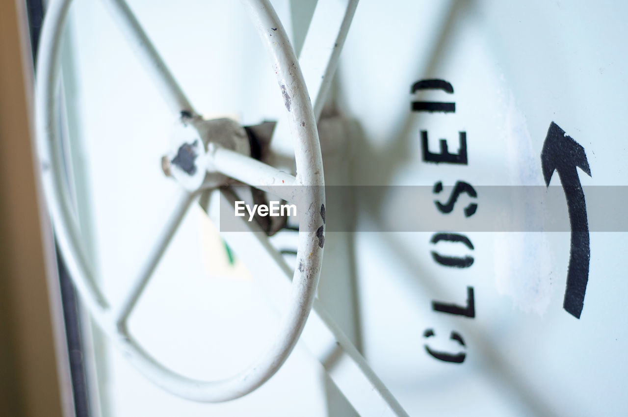 CLOSE-UP OF CLOCK ON THE WALL