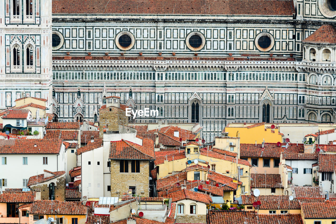 Houses against cathedral in florence