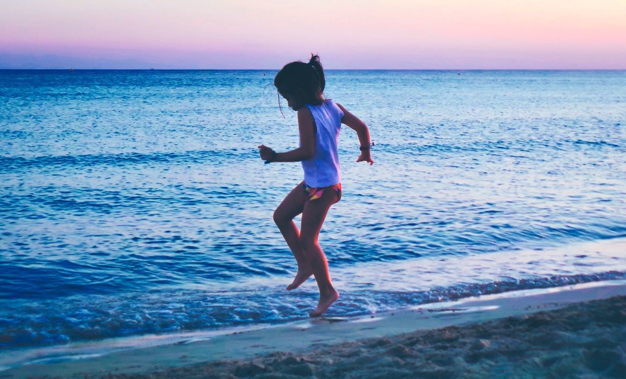 TOURISTS ENJOYING AT BEACH