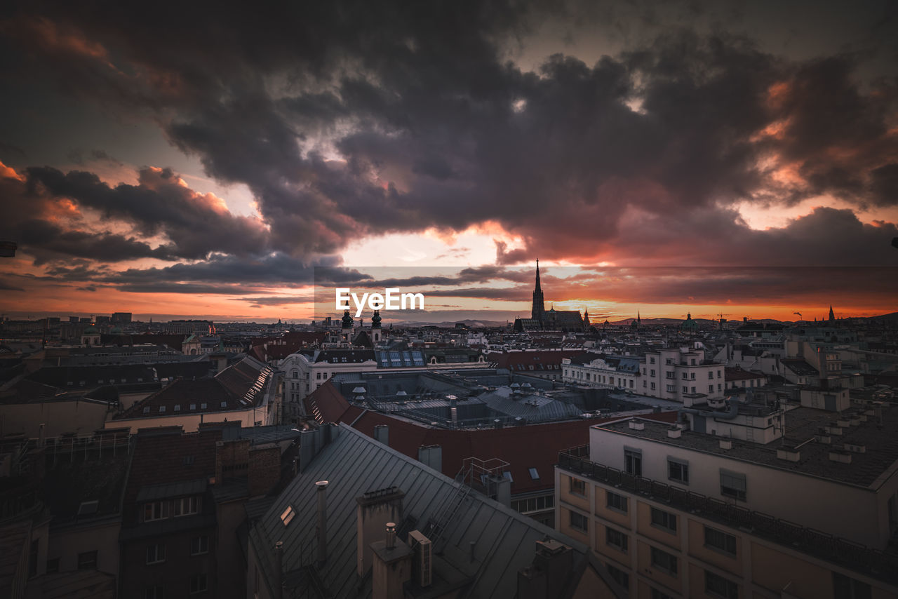 High angle view of townscape against sky at sunset