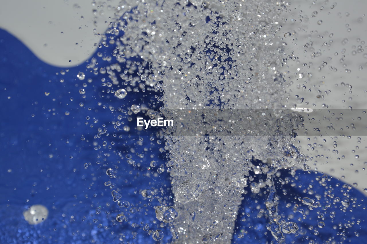 Close-up of water drops on glass