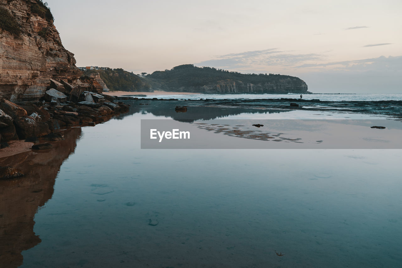 Scenic view of sea against sky during sunset