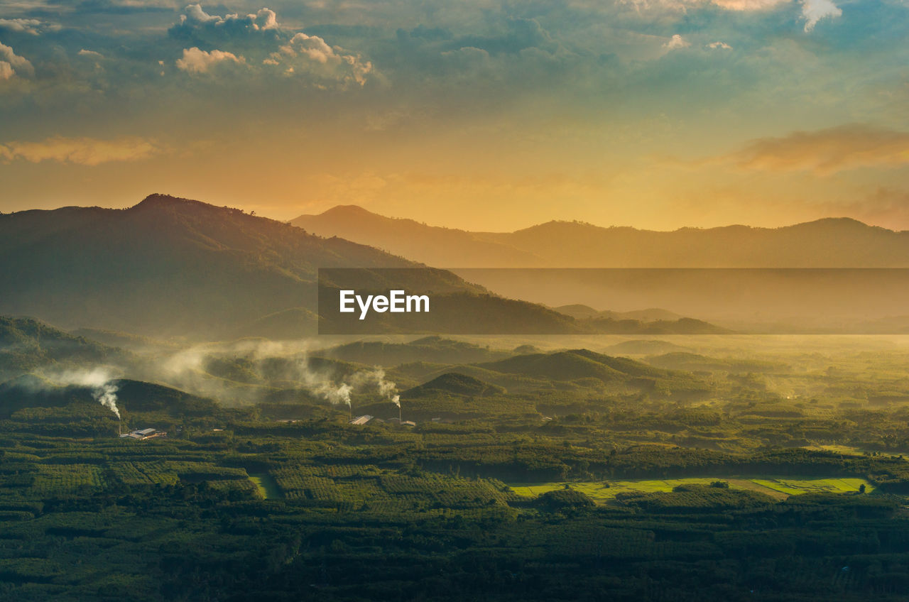 Scenic view of landscape against sky during sunset