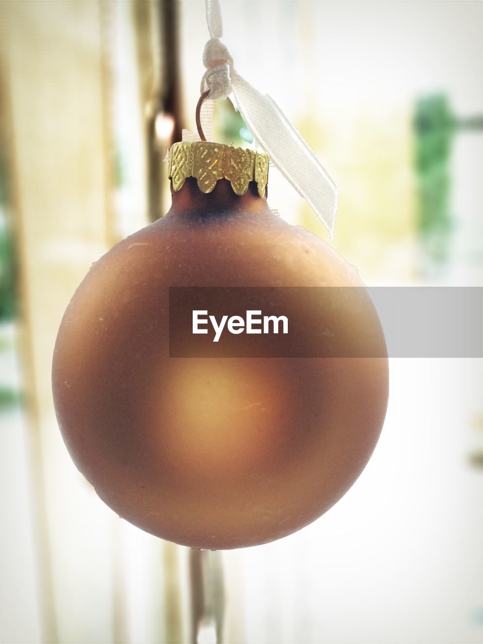 Close-up of christmas decoration hanging at home