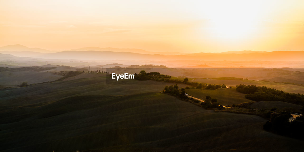 High angle view of idyllic rural landscape at sunset