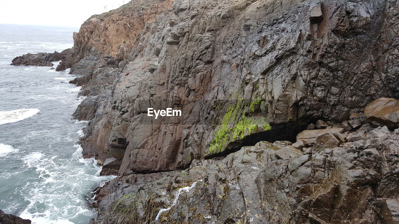 ROCK FORMATION ON BEACH