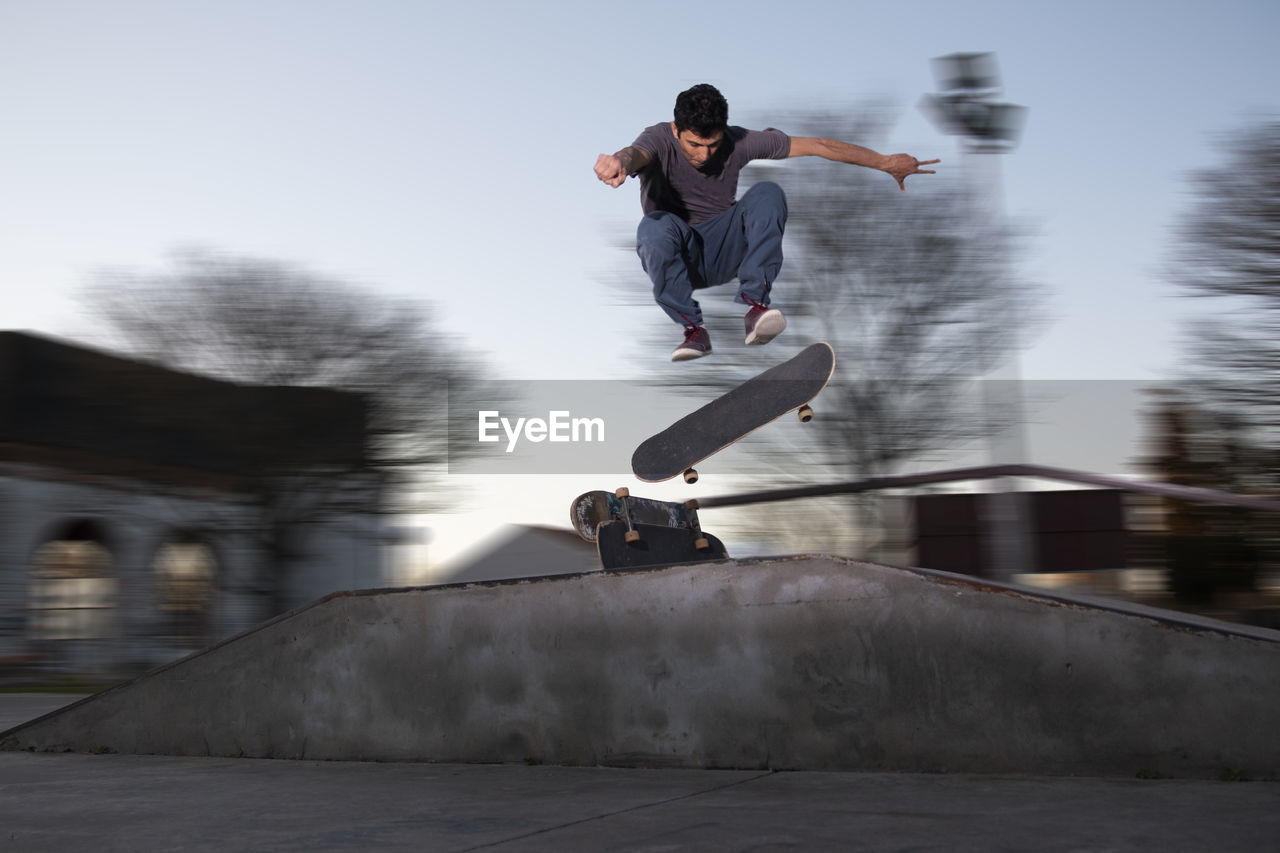 Full length of man skateboarding on skateboard