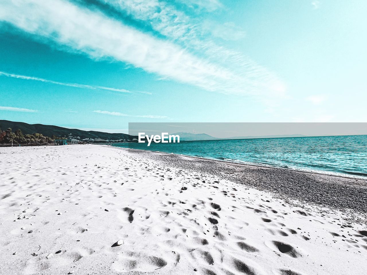 Scenic view of beach against sky