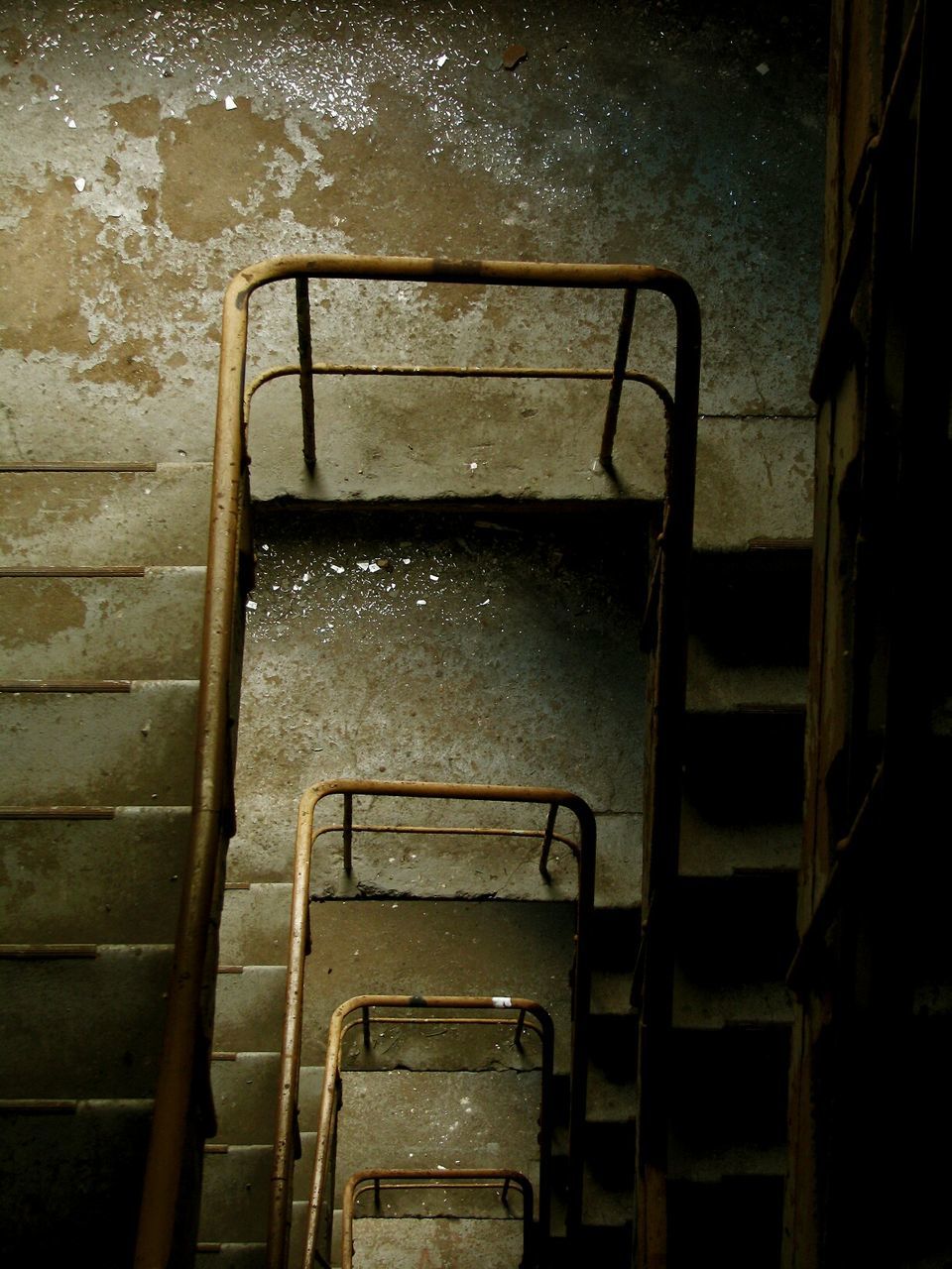 High angle view of staircase in abandoned building