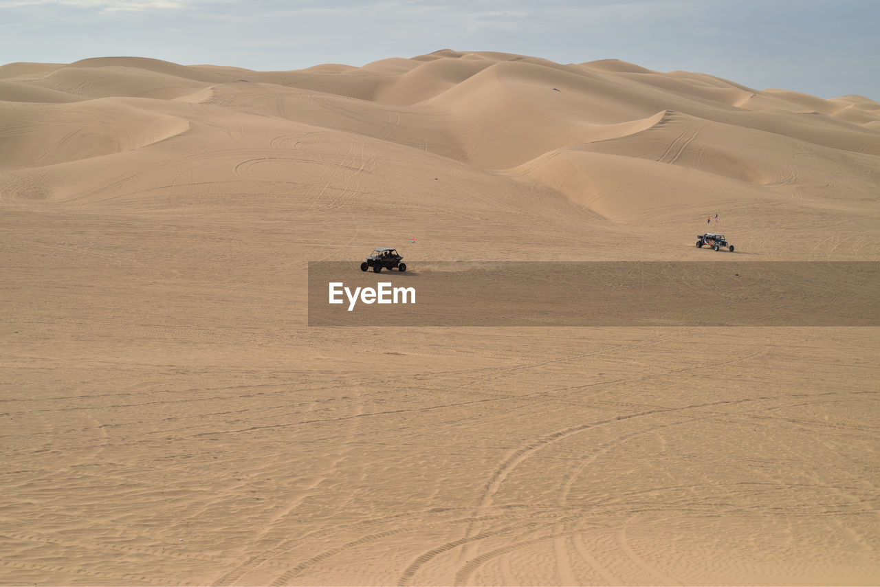 Vehicle moving on desert