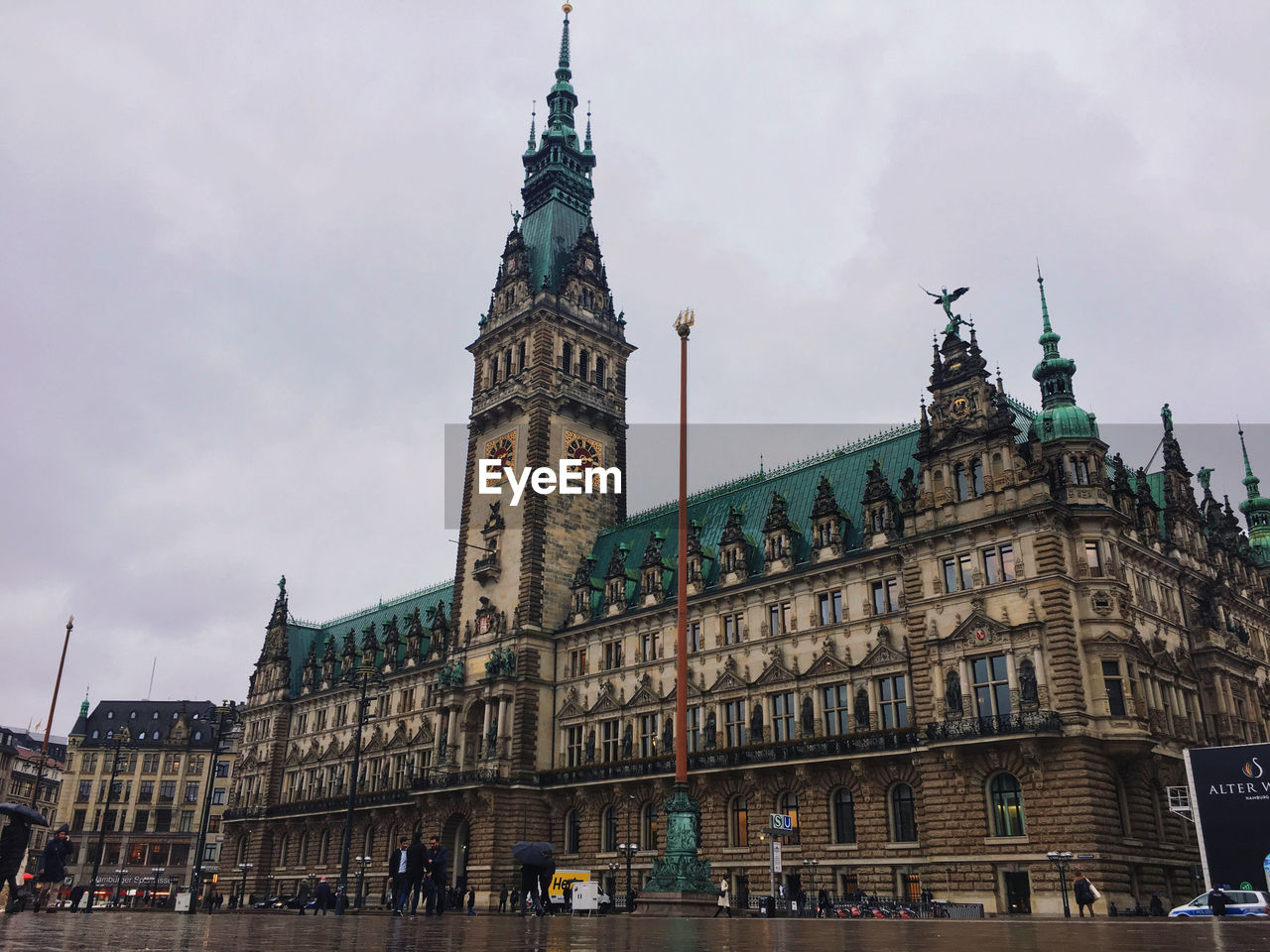 Low angle view of hamburg town hall against sky