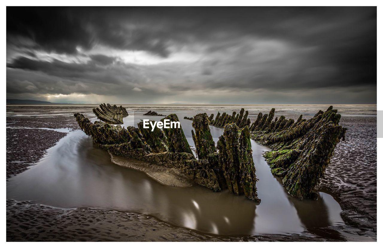 PANORAMIC SHOT OF SEA WAVES AGAINST SKY