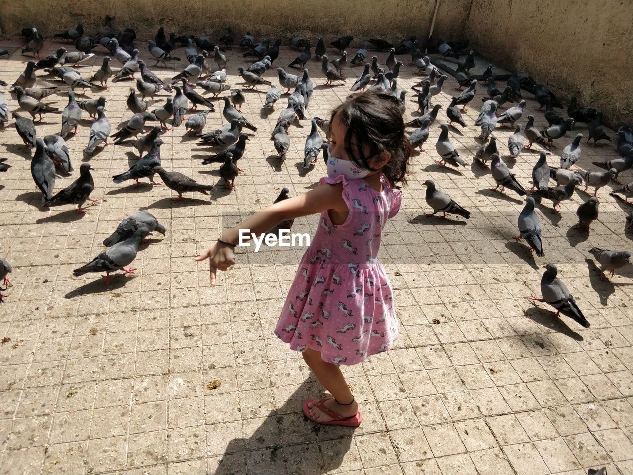 FULL LENGTH OF WOMAN WITH BIRDS