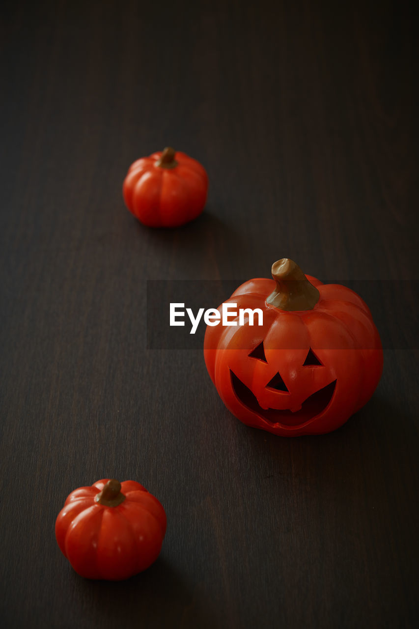 Halloween pumpkin on old wooden background