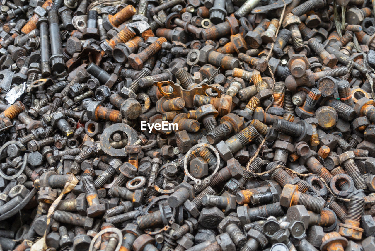 Full frame shot of rusty nuts and bolts