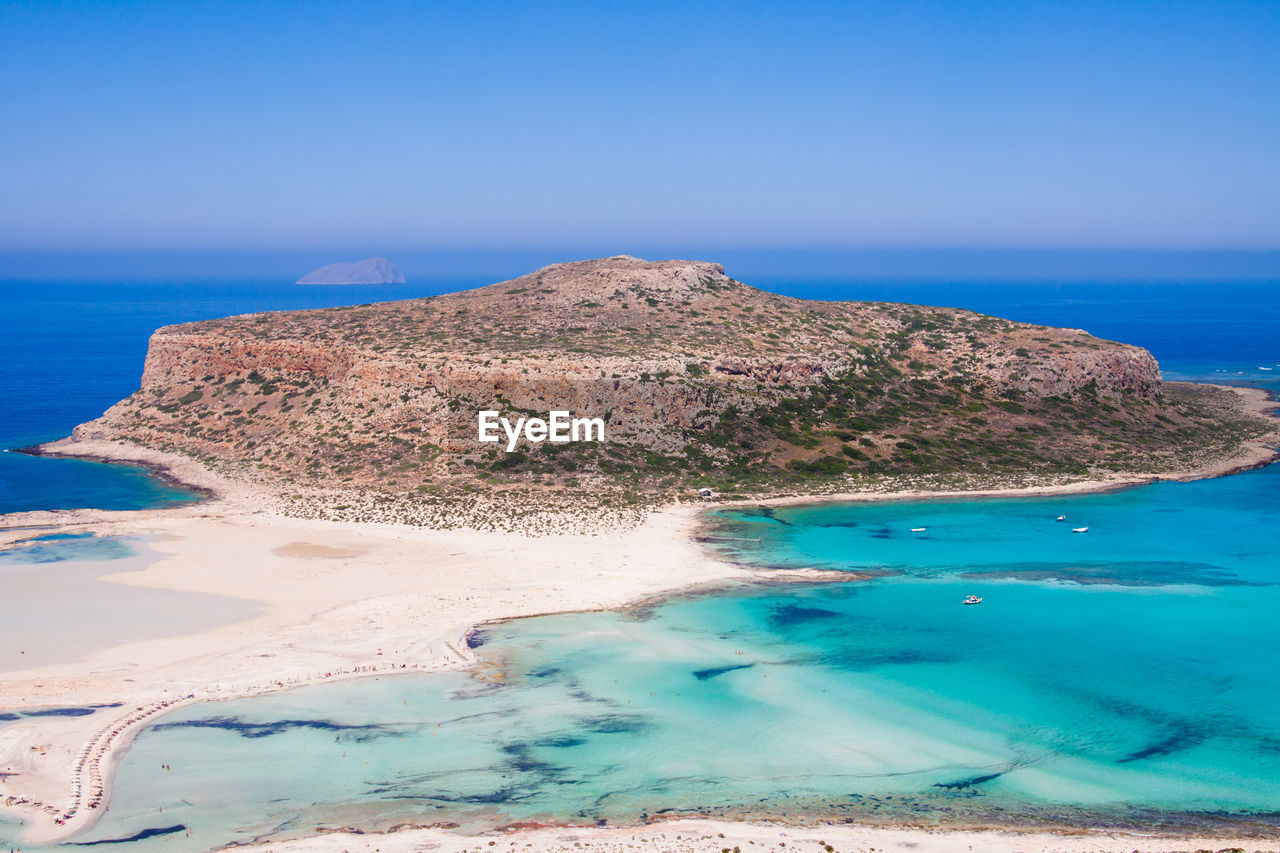 SCENIC VIEW OF BLUE SEA AGAINST CLEAR SKY